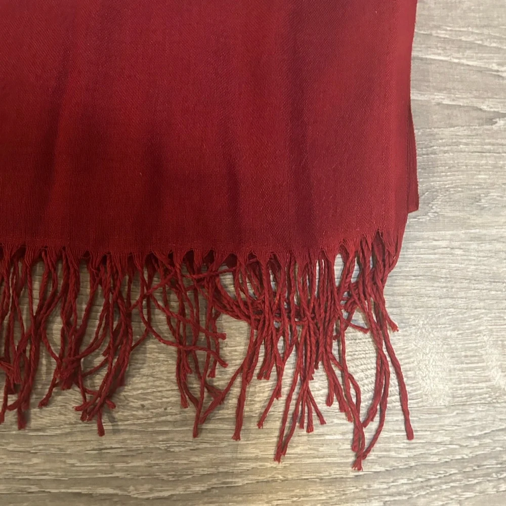 Red Fringe Scarf new with out tags perfect for 2026 trends!